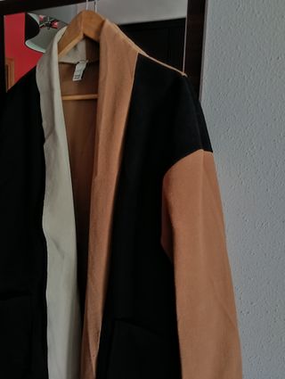 Abrigo largo con flecos