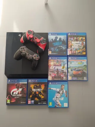 PS4 (PlayStation 4) con 7 juegos