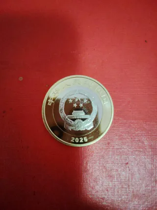 Moneda china bimetálica 10 Yuanes parque de Hainan