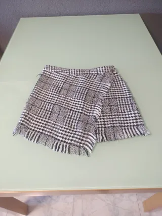 Falda mini cuadros flecos