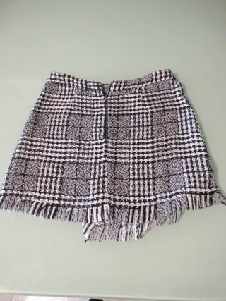 Falda mini cuadros flecos
