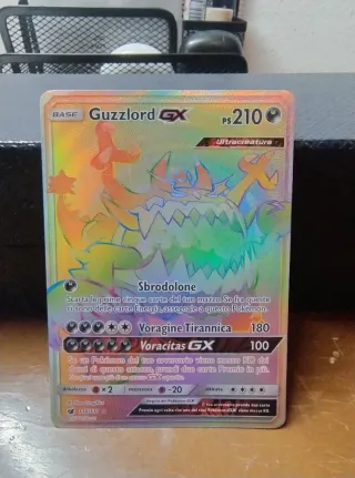 Guzzlord GX Full Art 116/111 Carte Pokemon