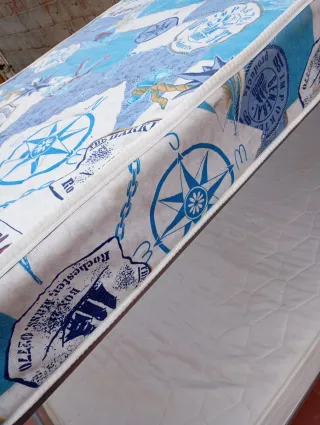 Literas metálicas con somieres de madera