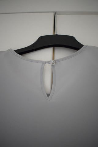 Blusa azul Burberry con ojales