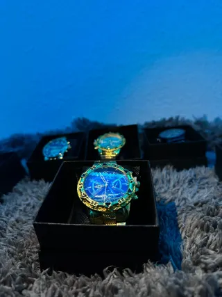 Relojes elegantes oro y verde (unidad 26)