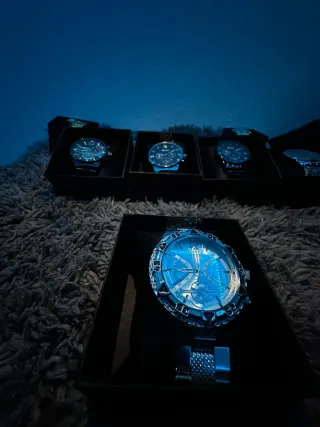 Relojes elegantes oro y verde (unidad 26)