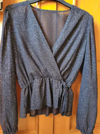 Blusa fiesta brillo negra y plata
