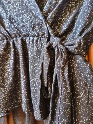 Blusa fiesta brillo negra y plata