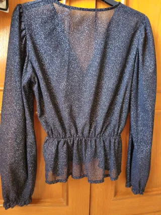 Blusa fiesta brillo negra y plata