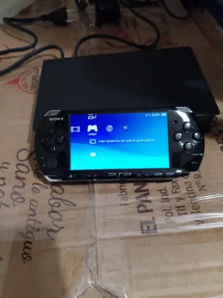 Sony PSP modelo 3000 Negra + 3 Juegos