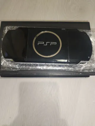 Sony PSP modelo 3000 Negra + 3 Juegos