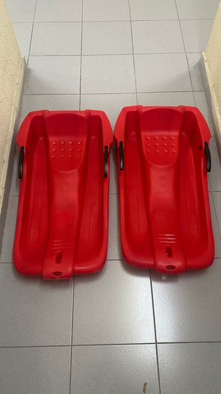 2 Trineos Decathlon Rojos
