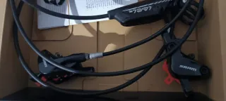 Frenos SRAM TL con abrazaderas ,uno nuevo están ok