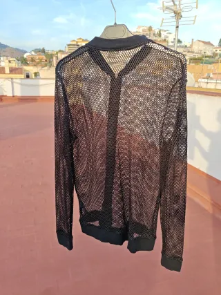 Chaqueta negra de rejilla