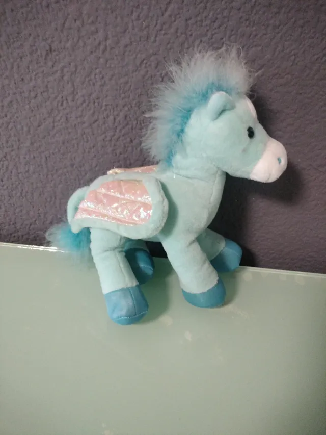 Peluche unicornio azul