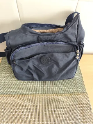 Lote 4 bolsos variados.