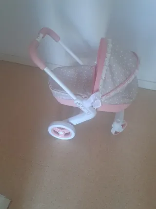 Carrito de bebé rosa y gris