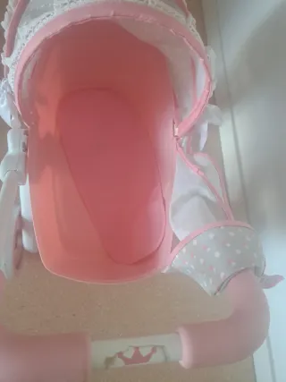 Carrito de bebé rosa y gris