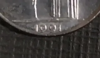 Moneta 100 Lire 1991 variante 99 con gambe chiuse