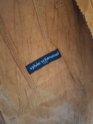 Chaqueta tipo gabardina en piel