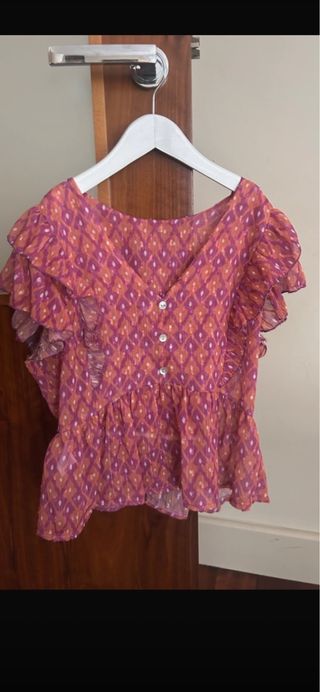 Blusa rosa con volantes talla única