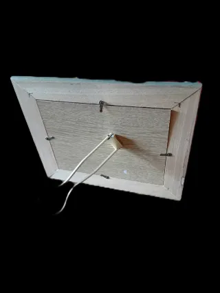 Portafotos de plástico y madera