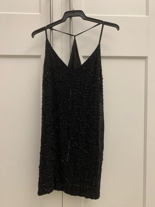 Top negro con pedrería