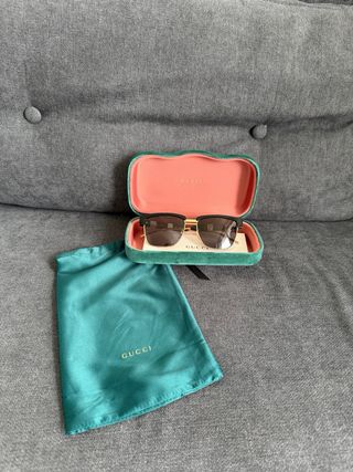 Gafas de Sol Gucci Negras y Doradas