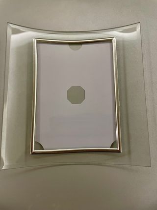 Coppia di eleganti cornici ricurve