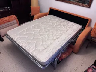 Sofá cama moderno naranja poco uso