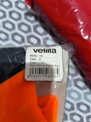 Chaqueta de trabajo naranja y azul y pantalón azul