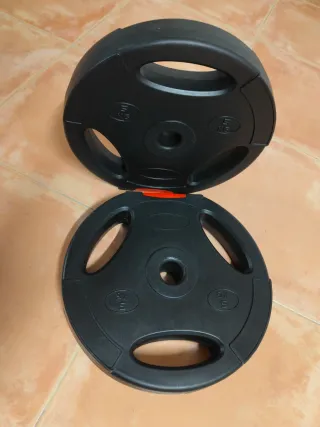 Discos de pesas 2x10kg y 2x5kg