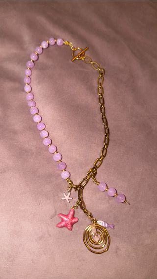 Colgante con charms intercambiables