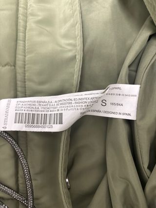 Chaleco largo verde con capucha Sorona