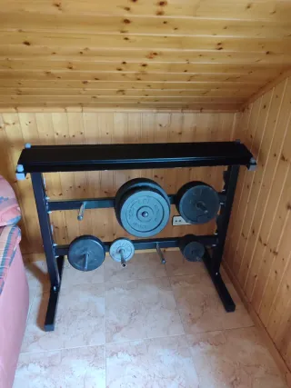 Supporto per dischi e manubri da palestra