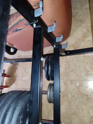 Supporto per dischi e manubri da palestra