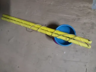 Diabolo Gioco con Bacchette Gialle