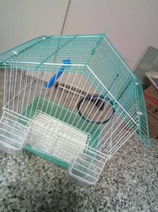 Jaula para periquitos en buen estado