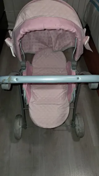 Carrito de muñecas rosa