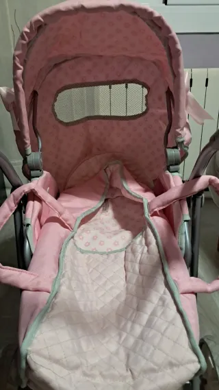Carrito de muñecas rosa