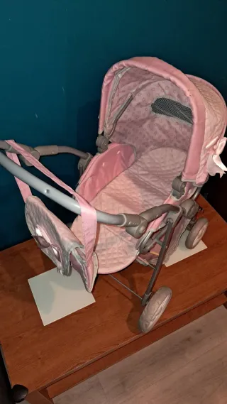 Carrito de muñecas rosa