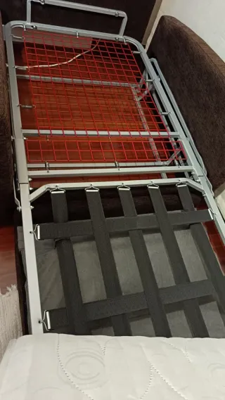 Butaca-cama tela marrón y naranja