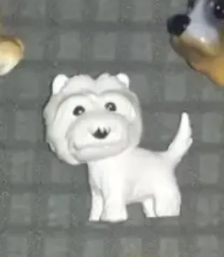 Figura perro Westie con collar rojo