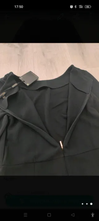 Vestido negro Massimo Dutti manga acampanada