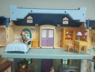 Casa de muñecas infantil