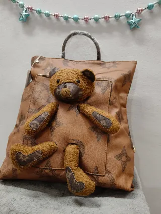 Zaino nuovo con cartellino con orsetto peluche