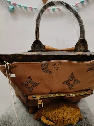 Zaino nuovo con cartellino con orsetto peluche