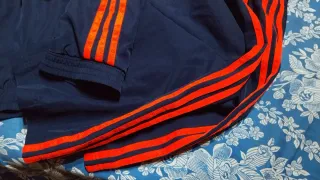 Chándal Adidas azul y naranja