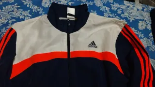 Chándal Adidas azul y naranja