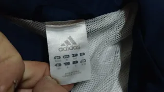 Chándal Adidas azul y naranja